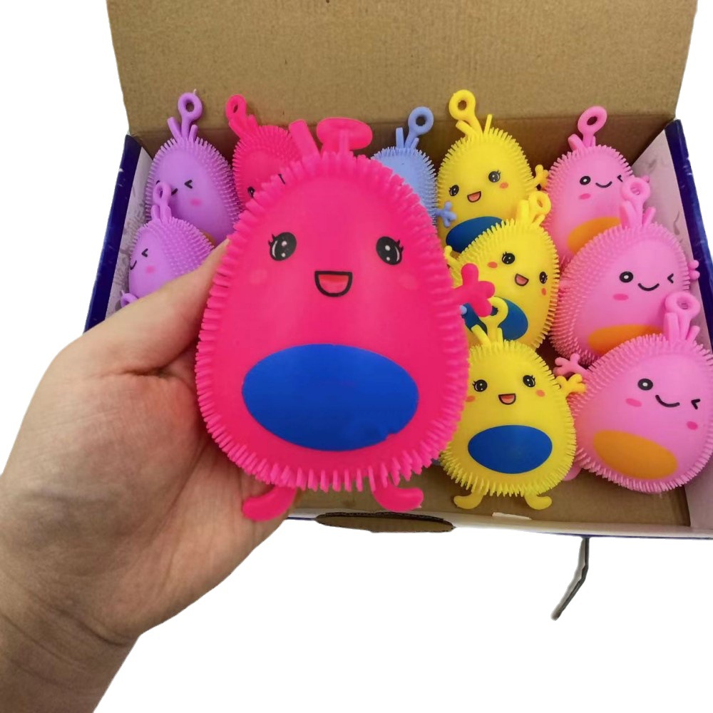 Dibujos Animados luminoso pellizco música descompresión muñeca lindo aguacate juguete decoración nuevo flash bola elástica lote