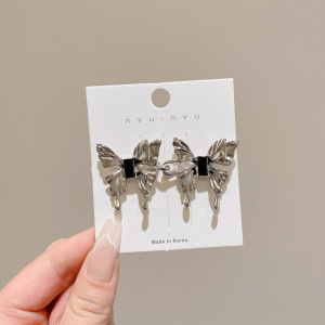 Pantalones de jeans de cintura, botones de cintura ajustados, botones ajustables fijos