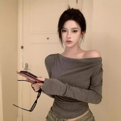 純粋な欲望のギャルの肩の長袖のtシャツの女性の秋の肩を露出して身につけて鎖骨の不規則感の短い上着を修理します。