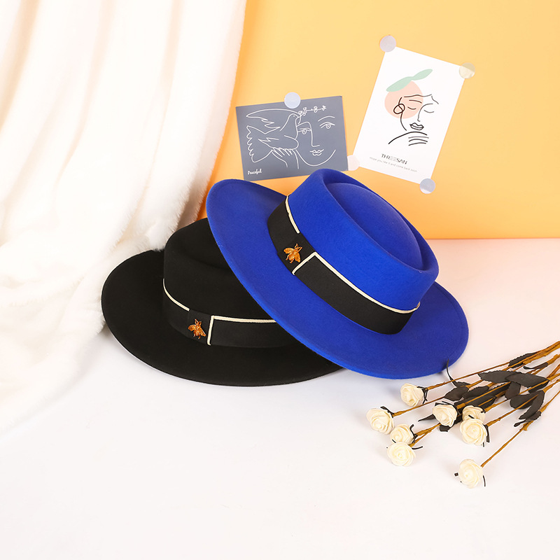 Sombrero de otoño e invierno lana pura cóncavo-cúpula convexa 8cm ala ancha sombrero de lana sombrero de fieltro de moda británica europea y americana al por mayor