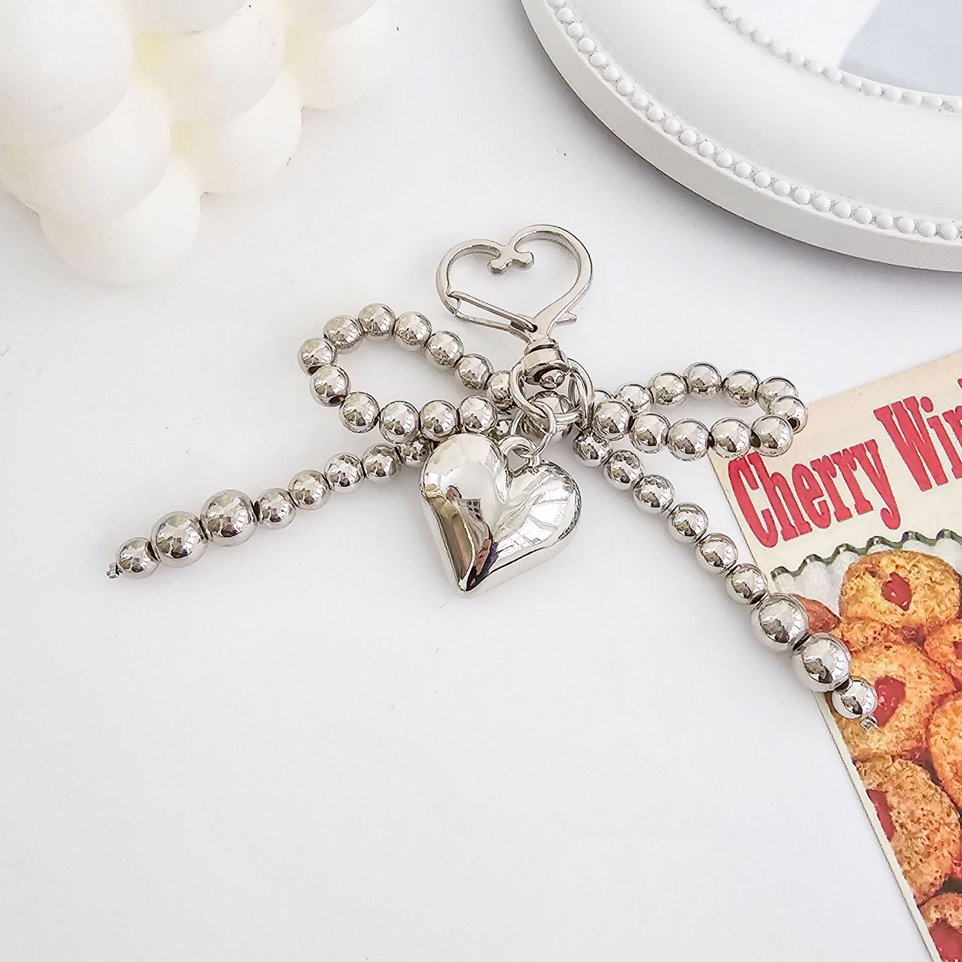 INS coreano arco de perla Go Ben cadena de amor llavero super universal perla simple colgante de bolsa