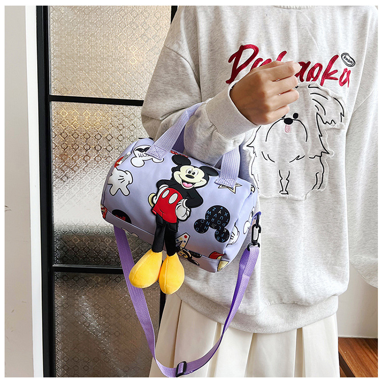 In 2024, the best-selling children's bags will feature cute Mickey Mouse-patterned bowling bags for girls, casual hand-held shoulder bags, and a unique style undefined