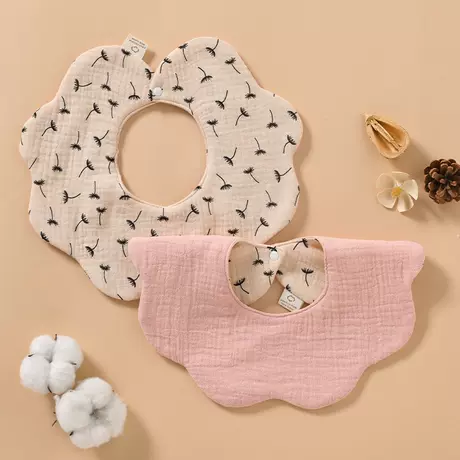 Double-sided waterproof bib with center layer - dandelion design