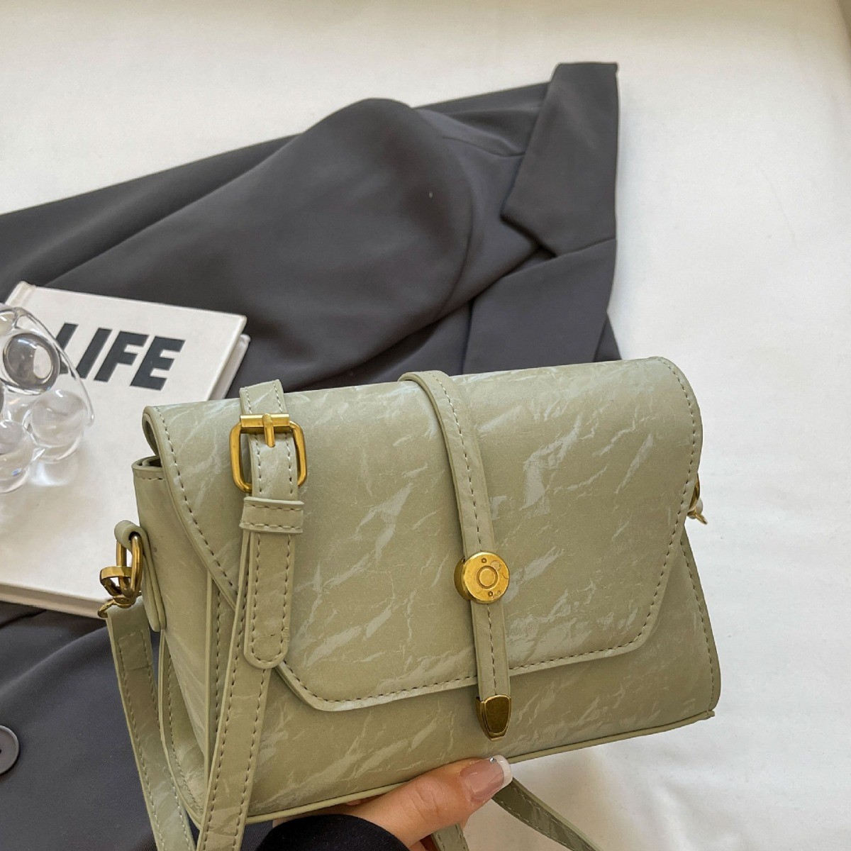 Retro small universal shoulder bag for leisure