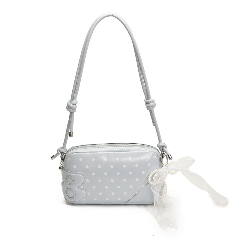 Bolso de moda coreano 2025 verano nuevo bolso femenino bolso de hombro de punto de onda de estilo extranjero celebridad de Internet bolso de mensajero del mismo estilo marea