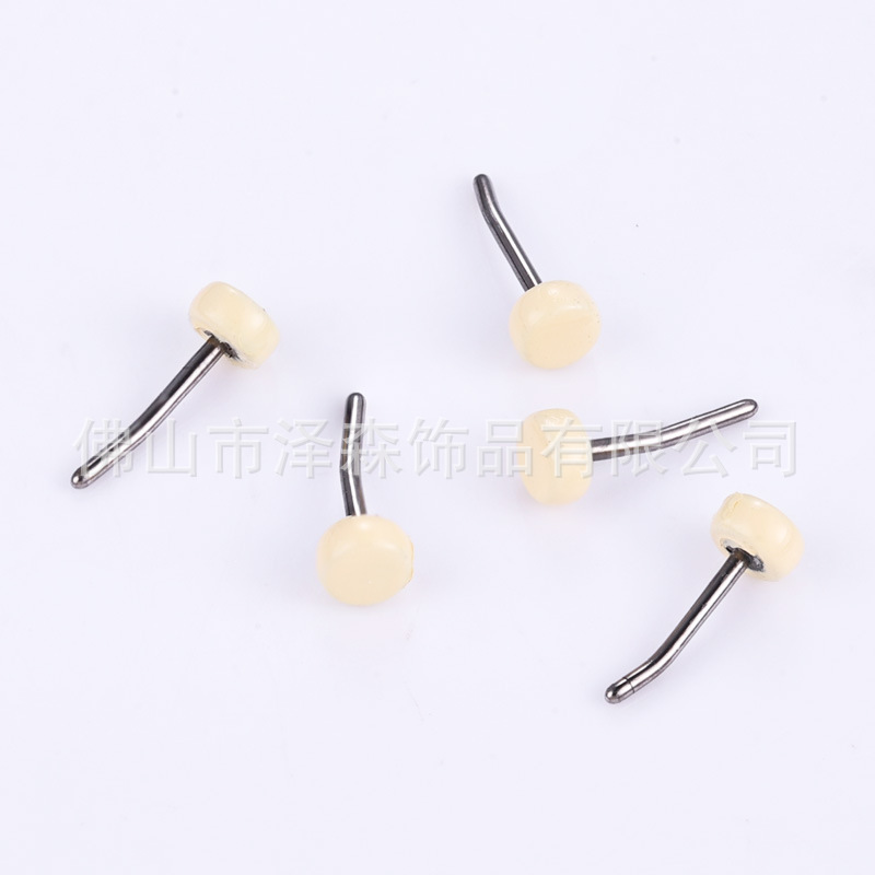 Silver pointed spike labret stud material detail