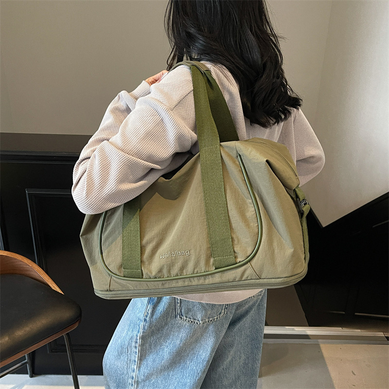 Bolso de viaje portátil coreano transfronterizo nuevo bolso de gimnasio ligero de gran capacidad bolso de viaje de viaje simple de ocio