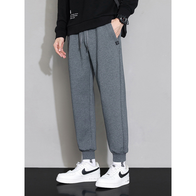 Pantalones deportivos de algodón de invierno y otoño más gruesos para hombres sueltos y versátiles, pantalones casuales de primavera