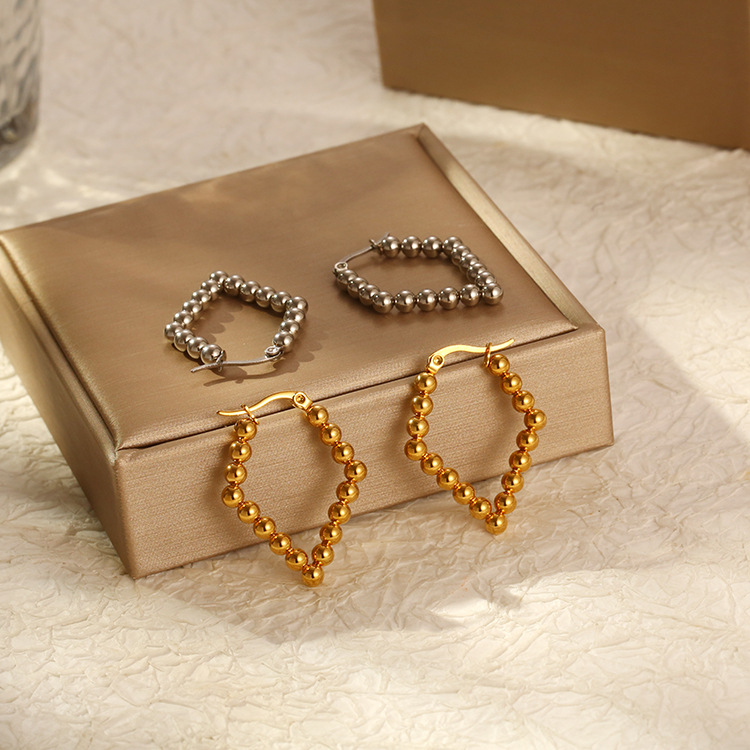 Pendientes INS europeos y americanos personalidad simple bola de acero inoxidable joyería transfronteriza puesto pendientes de anillo de alta calidad pendientes