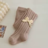 Fuchsia tights with bow, with embroidery