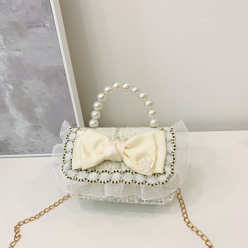 Niña tween pequeña bolsa de hombro arco encantadora princesa mochila de perlas de aire extranjero para niños bolsos lotes