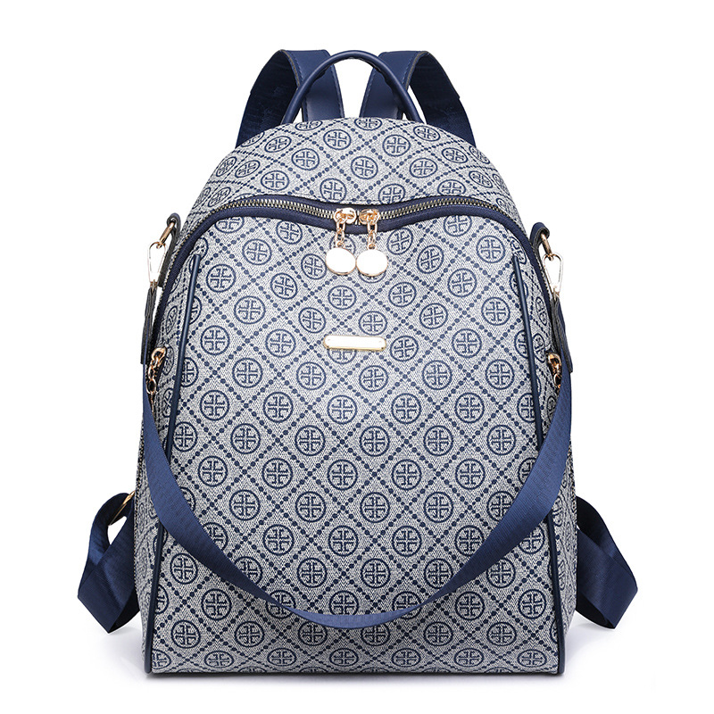 2024 nueva mochila de cuero suave casual para mujer, impresión de moda, color de contraste, mochila de viaje multifuncional de doble uso al por mayor