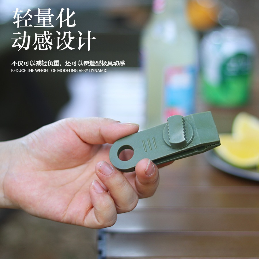 Outdoor tent with additional pull points, hippo clips for fixing large plastic clips, multi-person canopy for enhanced wind resistance.