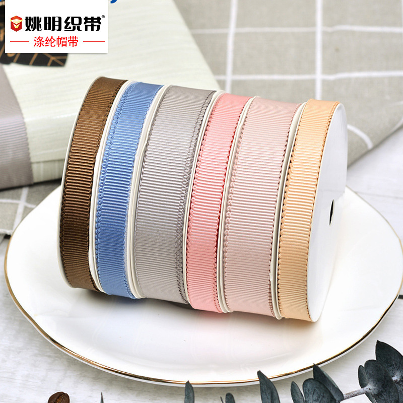 En stock 0,6 cm poliéster sombrero cinturón marca ropa plana accesorios borde envoltura cinta DIY hilo dentado borde sombrero cinturón