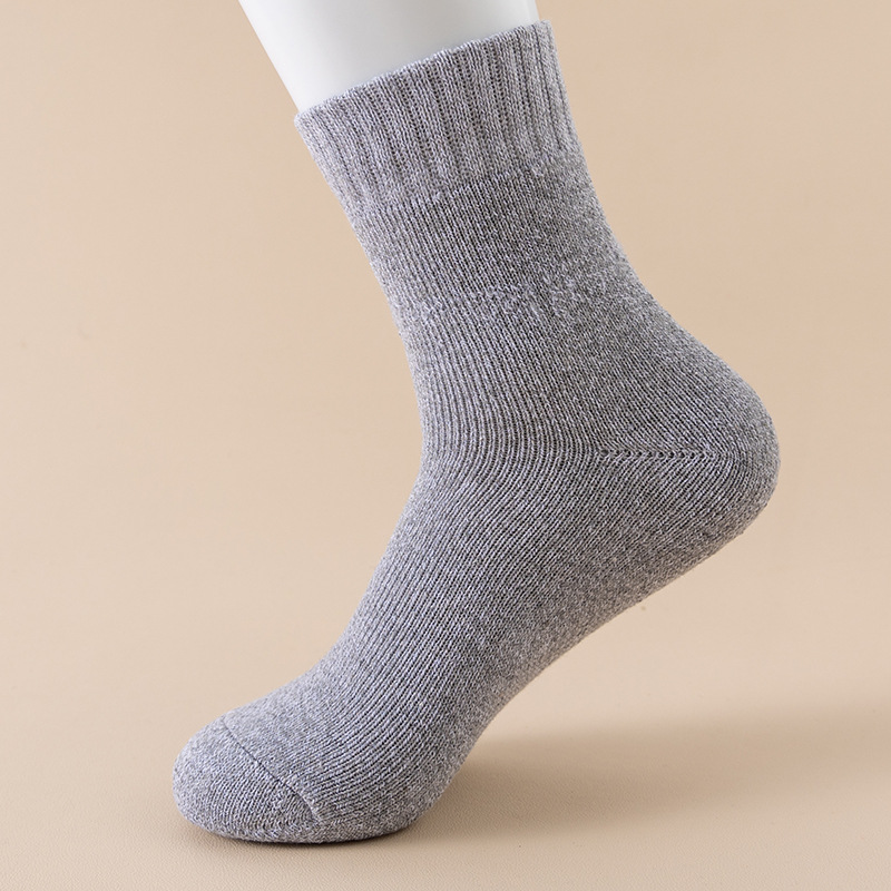 Calcetines de anillo para hombres de otoño y invierno más terciopelo grueso calcetines de piso de color sólido paralelo calcetines de toalla al por mayor transfronterizos