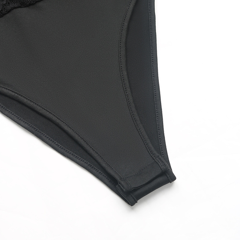 Tuta elegante nera in pizzo a maniche lunghe con inserti in mesh_voghion.com