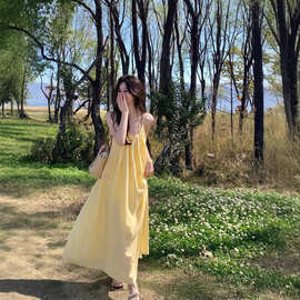 三亚海边度假黄色吊带裙露背连衣裙夏季宽松休闲沙滩裙仙女长裙子