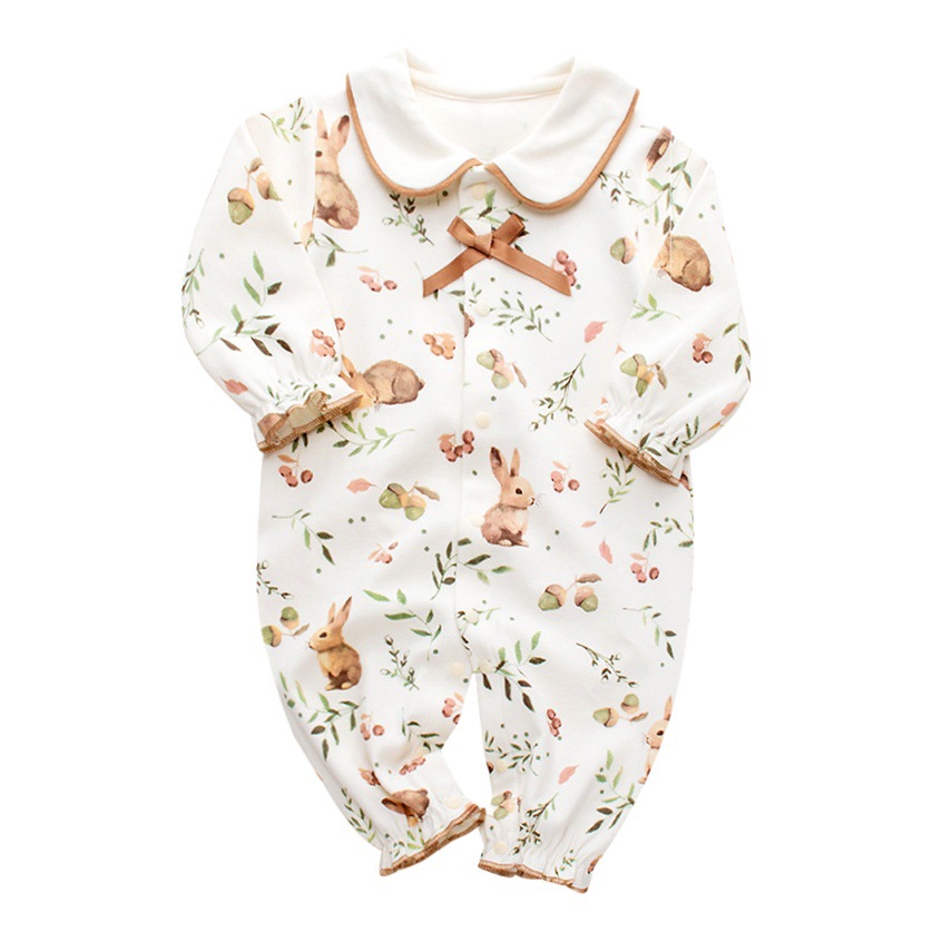 Primavera y otoño nuevo estilo pequeña princesa pintura al óleo viento pequeño conejo mampara recién nacido bebé algodón muñeca cuello de muñeca traje de sombrero de encaje