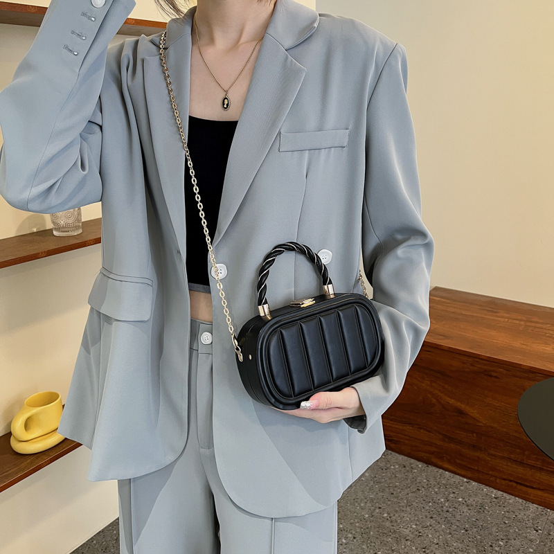 2023 new Korean style fashionable vertical strip embossed box bag high quality twisted hand chain shoulder crossbody bag_voghion.com