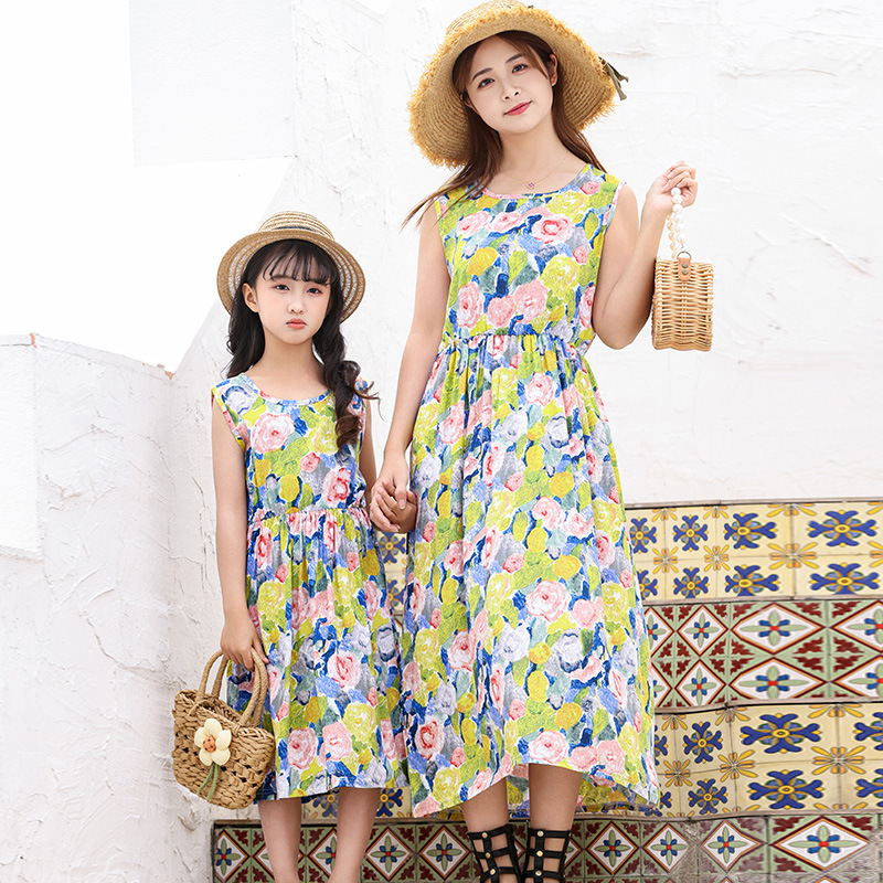 Verano nuevo estilo niña vestido de seda madre mujer padre-hijo vacaciones junto al mar moda casual playa estampado falda larga