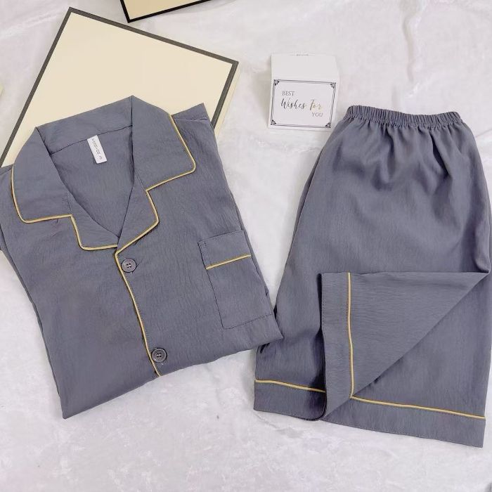 Pijamas de algodón de nube de solapa transfronteriza al por mayor cardigan para hombres pantalones cortos de manga corta de verano de dos piezas de color sólido