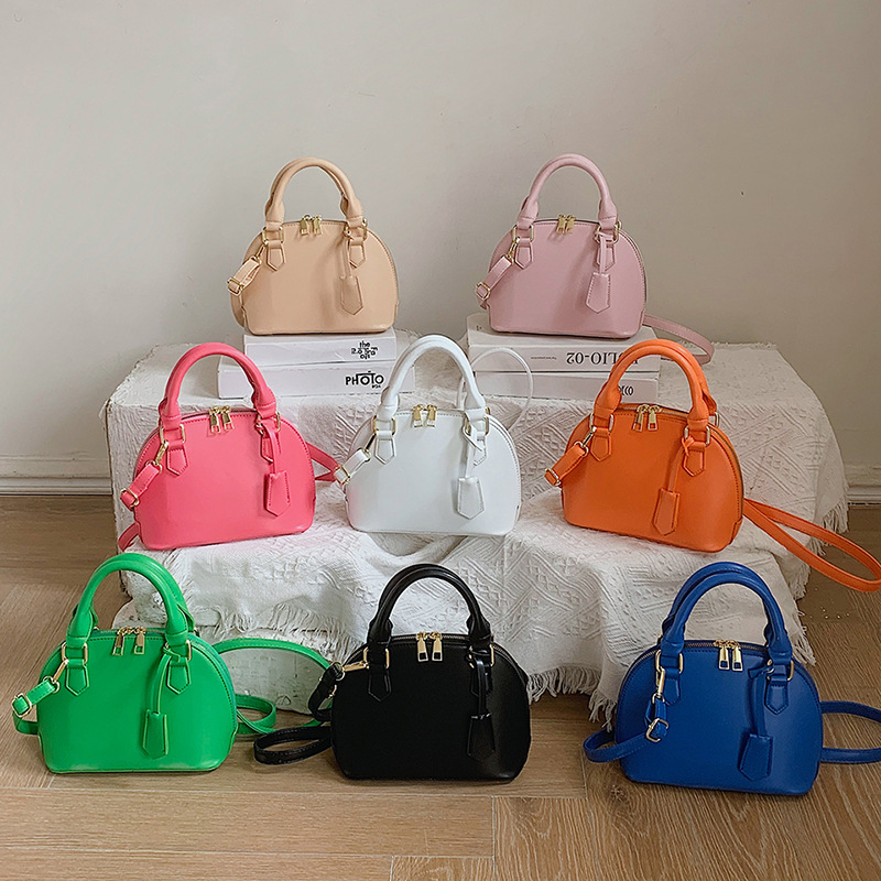 Bolso de hombro transfronterizo tendencia de moda femenina bolso de concha de color sólido al por mayor bolso de mensajero de diseño de nicho casual simple