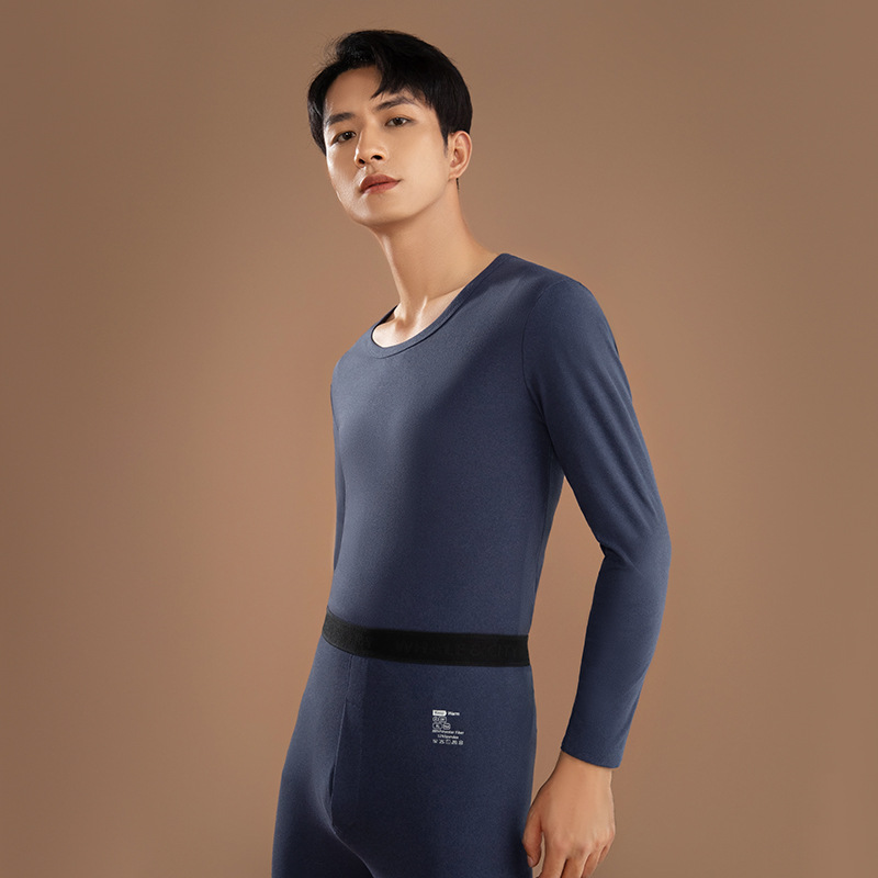 Ropa interior térmica de los hombres Calzoncillos largos finos de calefacción sin costuras traje de los hombres jóvenes de color sólido cuello redondo terciopelo Calzoncillos largos