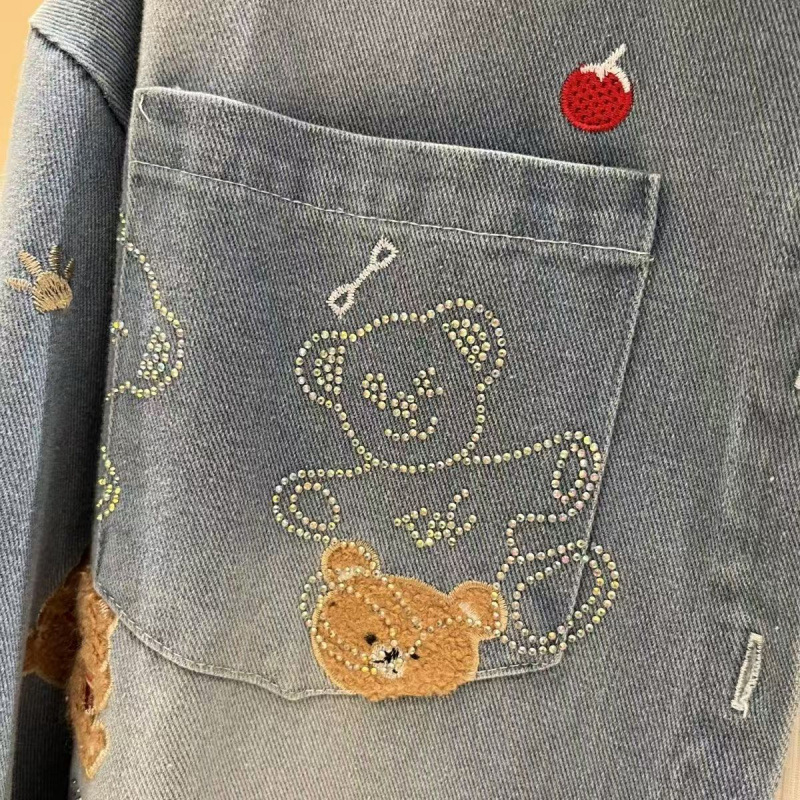 Solapa diamante caliente versión suelta de la chaqueta vaquero de oso grande temporada 2026 estilo extranjero ocio manga larga con camisa de mujer