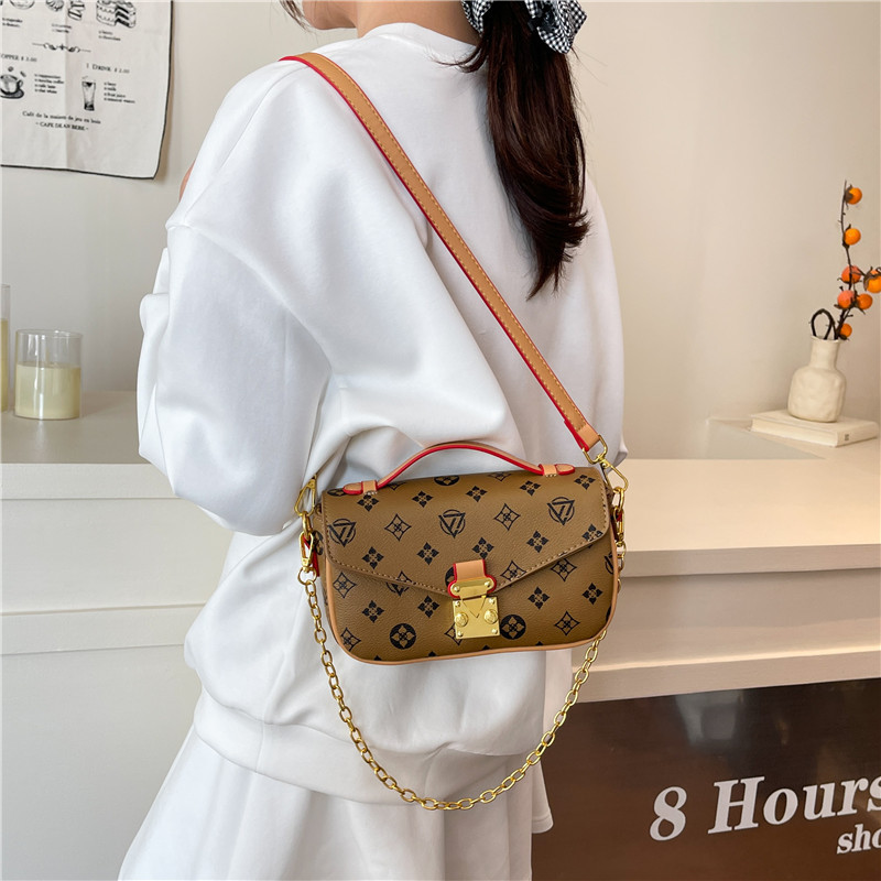 Bolso de textura transfronteriza 2025 verano nuevo bolso femenino retro color contraste bolso de hombro cadena de moda bolso de mensajero marea