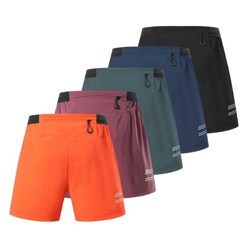 Estirar los pantalones deportivos ajustados de doble capa de los hombres falsos de dos piezas fitness correr baloncesto entrenamiento de maratón de secado rápido pantalones cortos de tres puntos