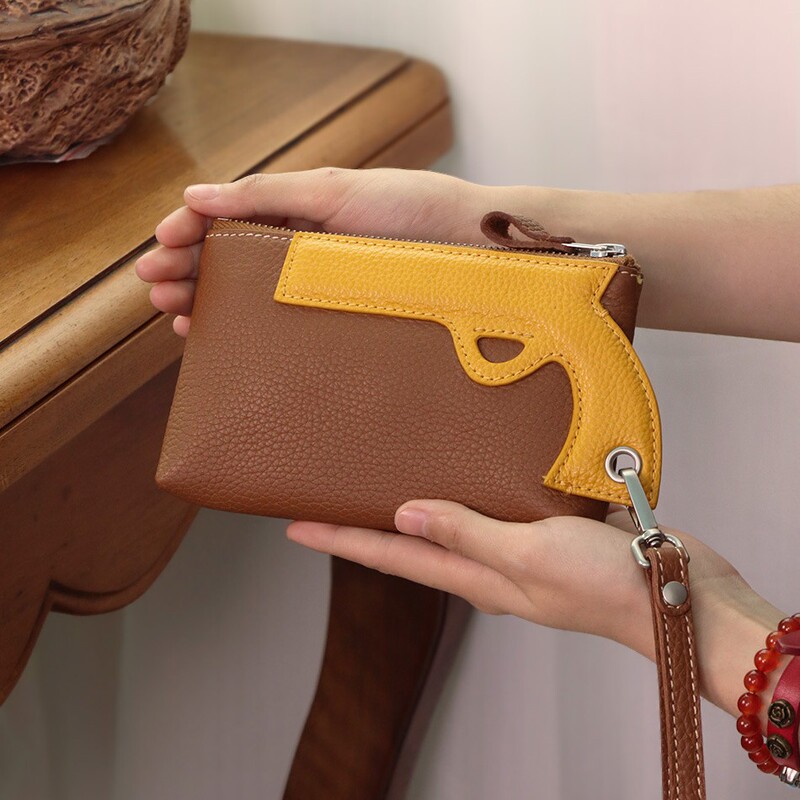 J6 First-Layer Cowhide Designer Original Personalized Gun-Shaped Small Clutch Bag, Fashionable, Portable and Versatile Coin Purse 6926 J6 First-Layer Cowhide Designer Original Personalized Gun-Shaped Small Clutch Bag, Fashionable, Portable and Versatile Coin Purse 6926