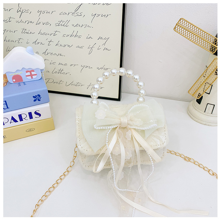 Bolsos de princesa transfronterizos nuevos bolsos de invierno y otoño de encaje de arco de tejido bolsos de mano de chicas cadenas bolsos de mochila accesorios