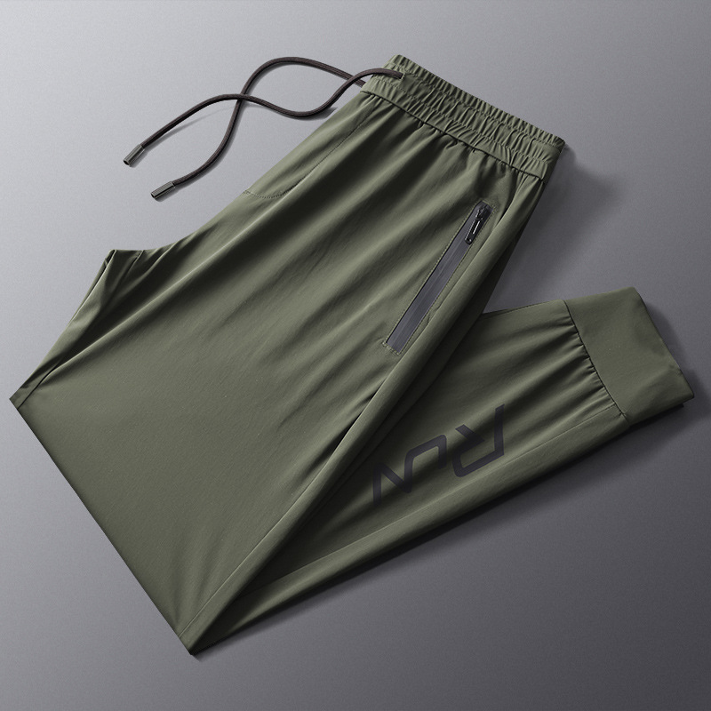 Pantalones deportivos de seda de hielo para hombres de verano delgados aire acondicionado pie suelto secado rápido respirado pantalones de entrenamiento de nueve puntos