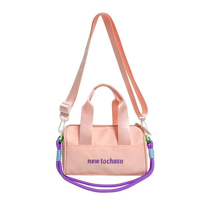 Bolsa de hombro casuales coreana para niños y niñas, letras extranjeras para bebés, bolsas portátiles de balde de agua 2025, nuevas bolsas de comercio exterior para niños