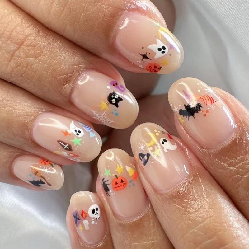 Halloween Skin-Colored Short Oval Cute Ghost Pumpkin Bat Black Cat Graffiti Design Wearable Nail Art Nail Tips Halloween Skin-Colored Short Oval Cute Ghost Pumpkin Bat Black Cat Graffiti Design Wearable Nail Art Nail Tips