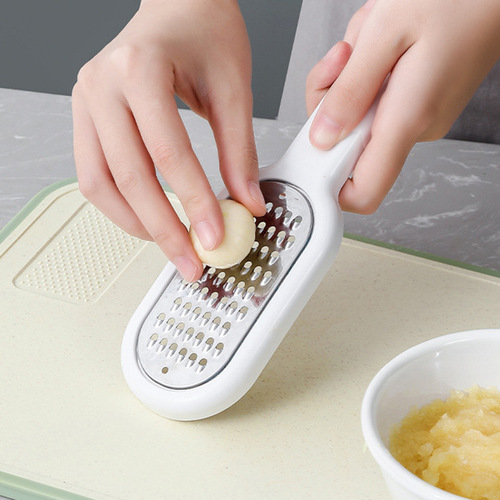 Three-in-one grater wholesale kitchen lazy multi-functional vegetable cutting and grating onions and ginger shreds garlic and potato shreds