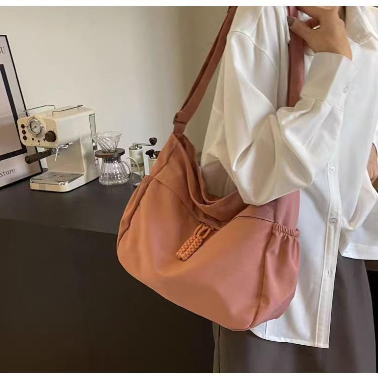 简约大容量帆布包女休闲百搭通勤单肩托特包大学生上课斜挎包书包