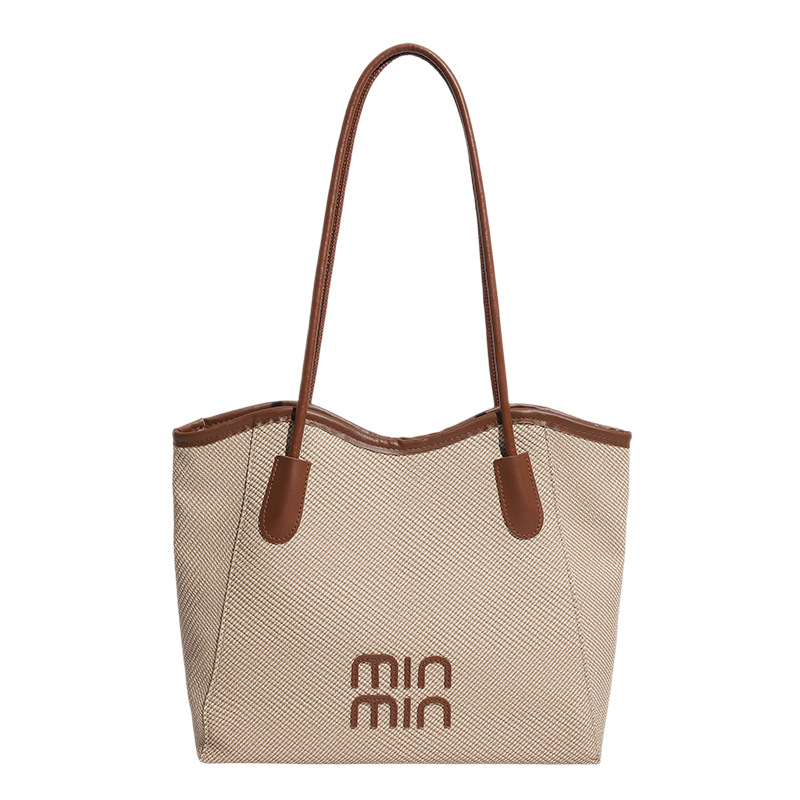 Nuevo tipo transfronterizo de gran capacidad de moda retro versátil de alto valor de la cara bolsas de hombro bolsas especiales para estudiantes universitarios
