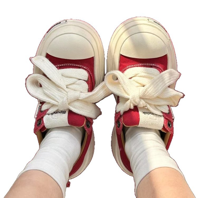 Zapatos de lona vendados zapatos pornográficos en blanco y negro zapatos de cabeza grande marea nacional suela gruesa moda masculina y femenina retro 100 zapatos de tablero de aumento