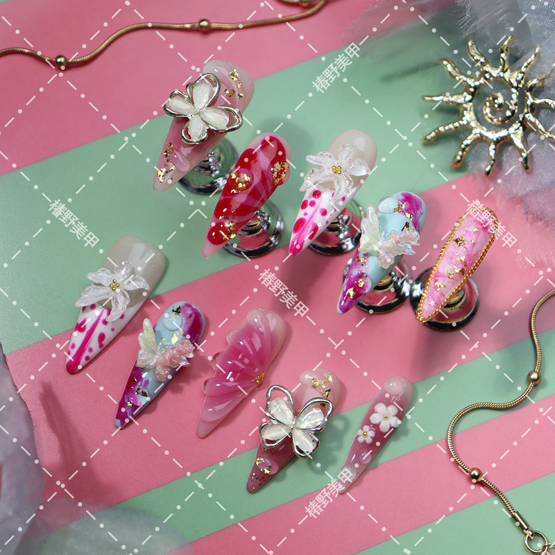 Pink gradient spring-summer butterfly flower nail art pieces, handmade press-on nails, French carved design, European and American cross-border boutique press-on nails Pink gradient spring-summer butterfly flower nail art pieces, handmade press-on nails, French carved design, European and American cross-border boutique press-on nails
