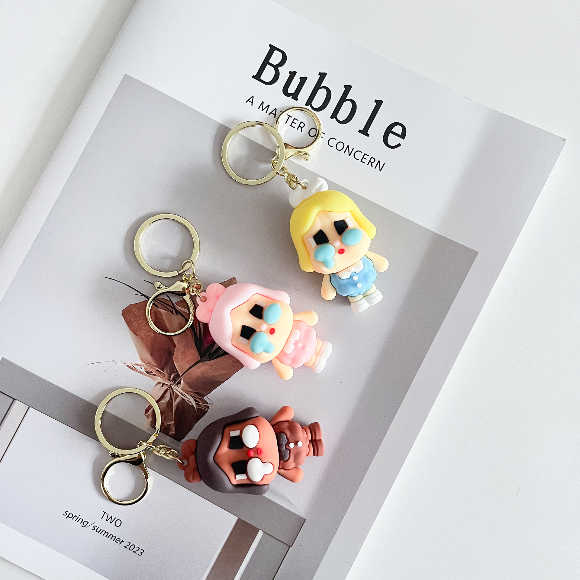 Nuevo llavero de muñeca de lágrima linda muñeca de dibujos animados de goma suave llavero de coche bolso de regalo de moda colgante