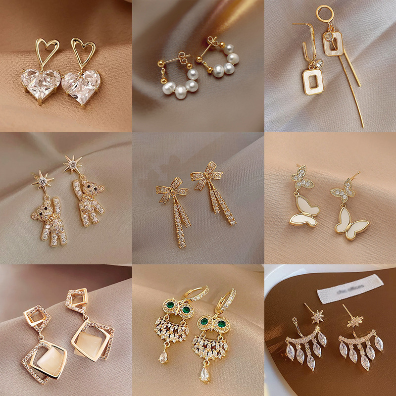 Mode Herzform Schmetterling Bogenknoten Kupfer Inlay Künstliche Perlen Hülse Zirkon Ohrringe 1 Paar display picture 1