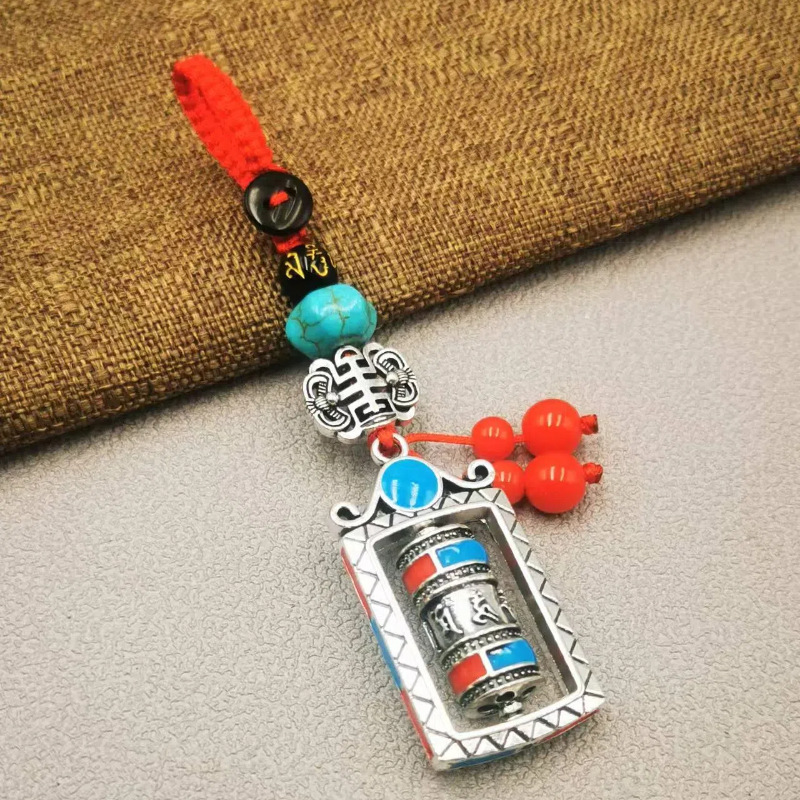 Convertible estilo étnico Xizango amuleto de la suerte llavero coche masculino diamante Maja oración rueda colgante punto escénico al por mayor