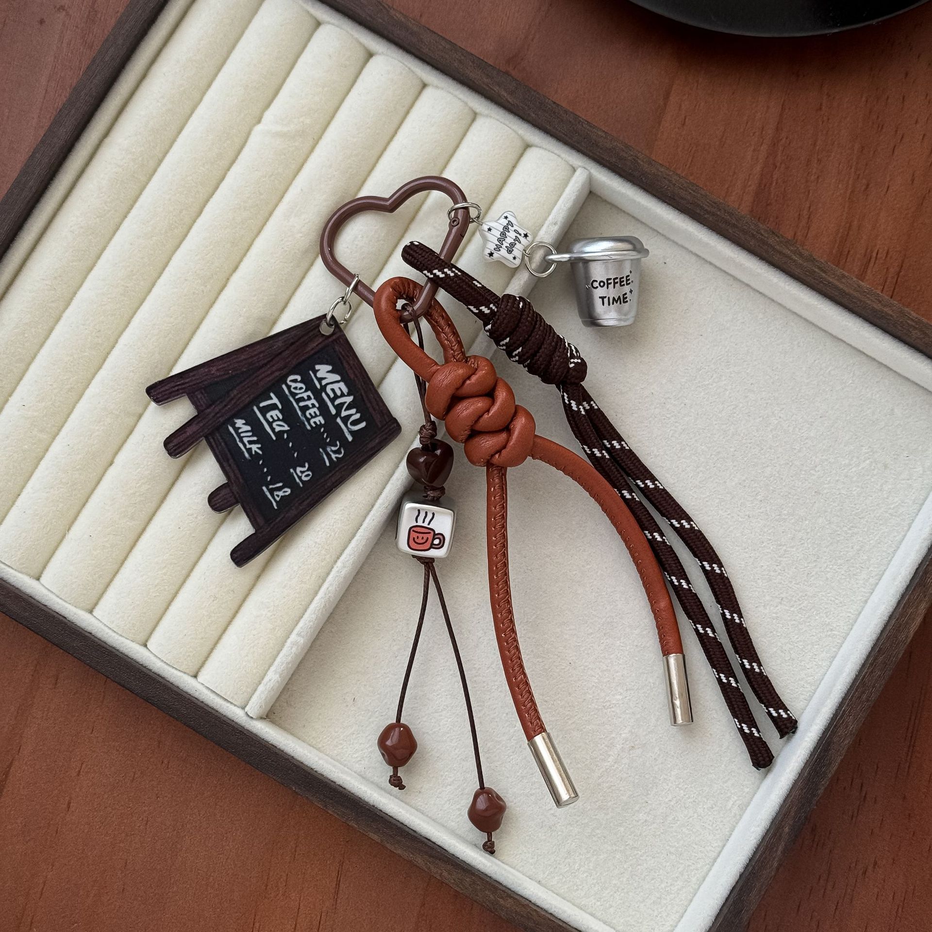 American retro coffee cup keychain with woven rope, small blackboard menu pendant, Maillard-style ambiance bag accessory