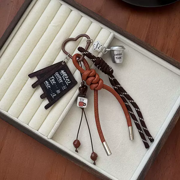 American retro coffee cup keychain with woven rope, small blackboard menu pendant, Maillard-style ambiance bag accessory