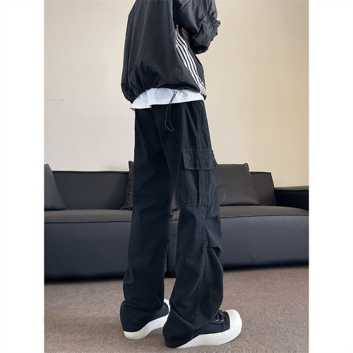 American-style functional multi-pocket casual lumberjack overalls—unisex, versatile, relaxed-fit, with slightly flared wide legs and a parachute-inspired design for spring and fall.