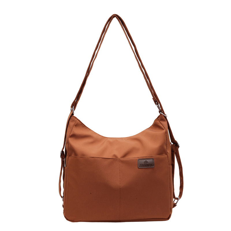 Nueva mochila multifuncional para mujer, bolso de viaje de textura de moda, bolso de mensajero, mochila de nailon de gran capacidad, bolso de hombro