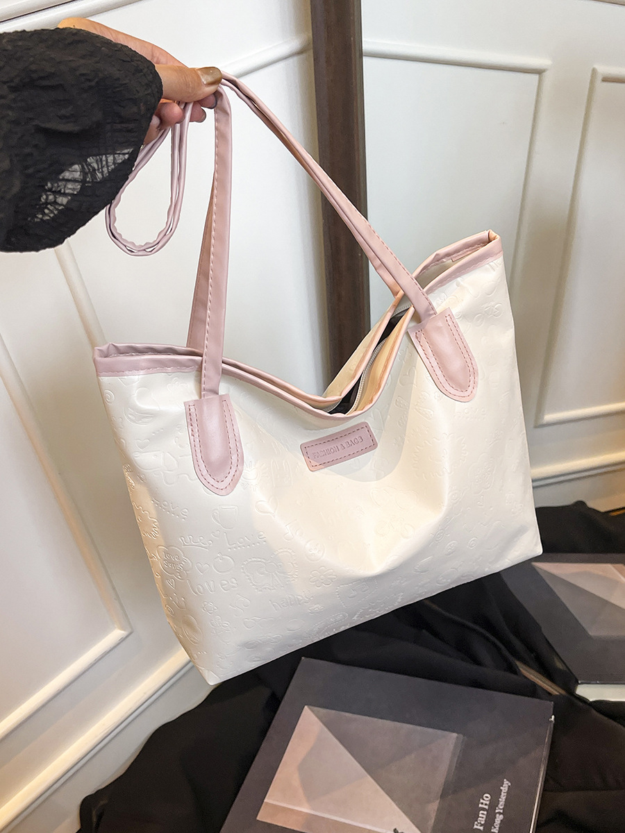 Gran capacidad de venta en caliente bolso para mujeres 2026 nuevo estilo simple universal de viaje bolso de hombro bolso de mano bolso de moda ocio