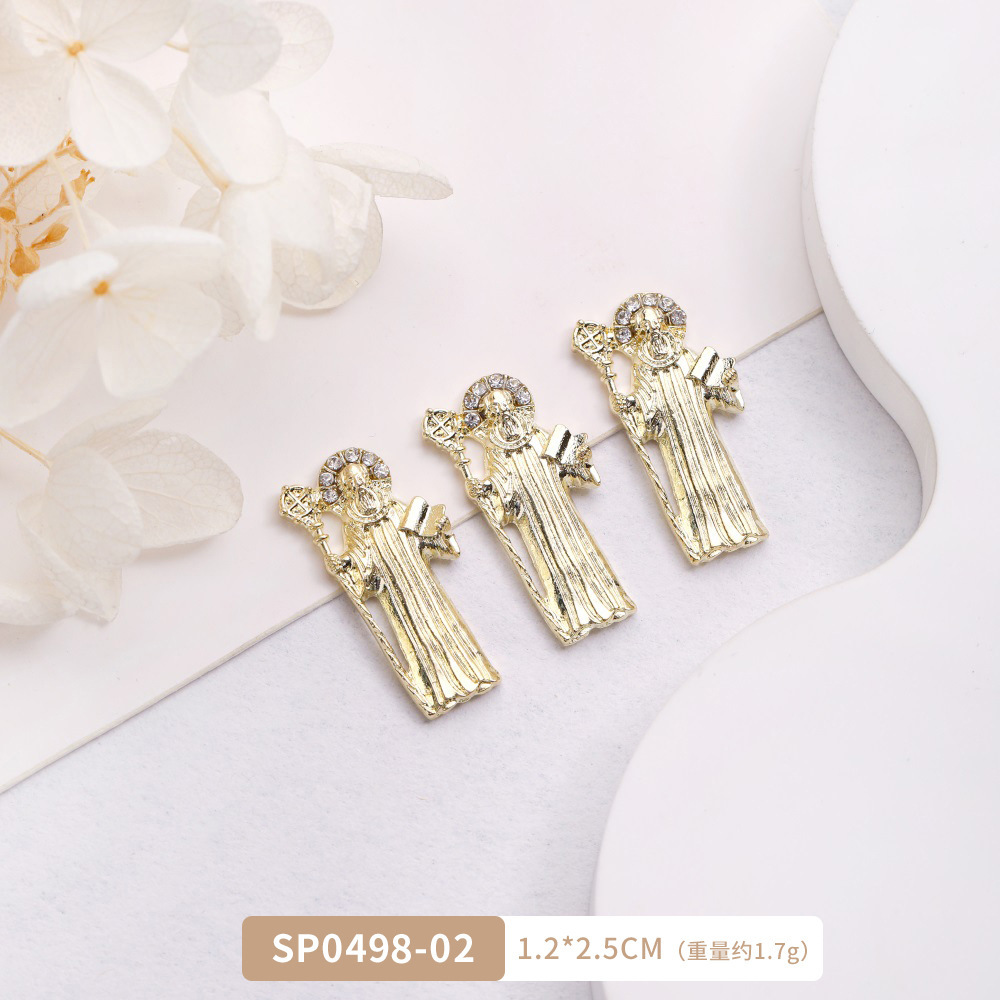 Arte de uñas transfronterizo Jesús accesorios de metal DIY vintage metal aleación uñas arte joyería europea y americana Luz de lujo accesorios con diamante