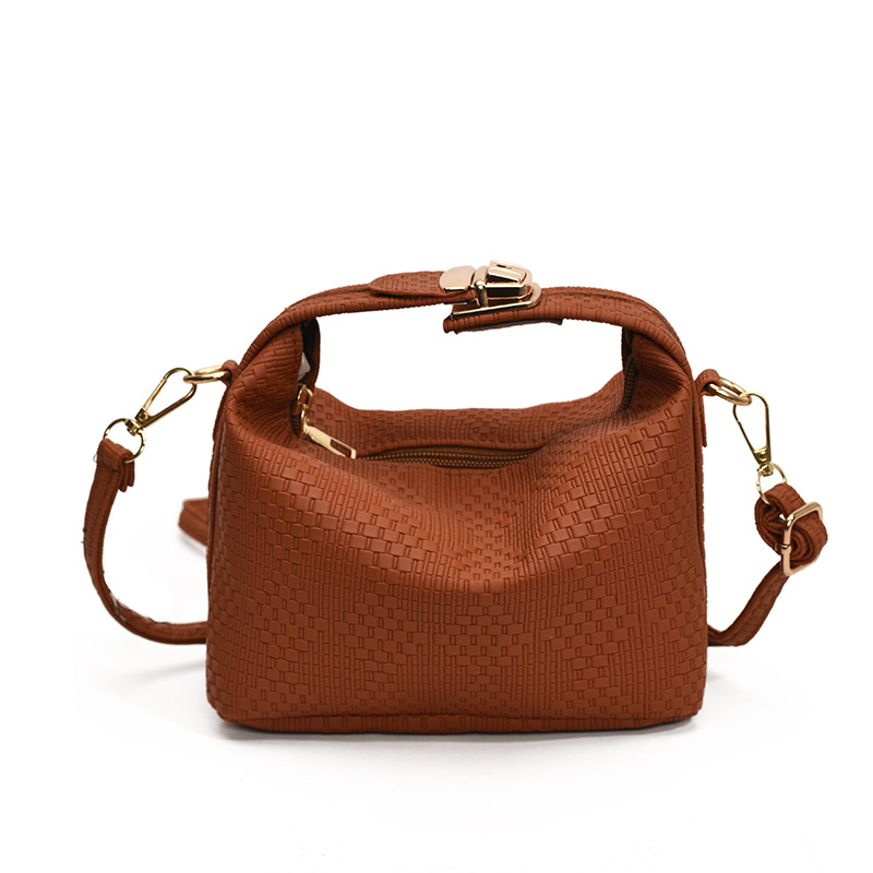 Bolsa de mano a rayas de moda coreana para mujeres otoño / invierno 2024 nuevo estilo simple bolso de hombro personalizado gran capacidad mochila